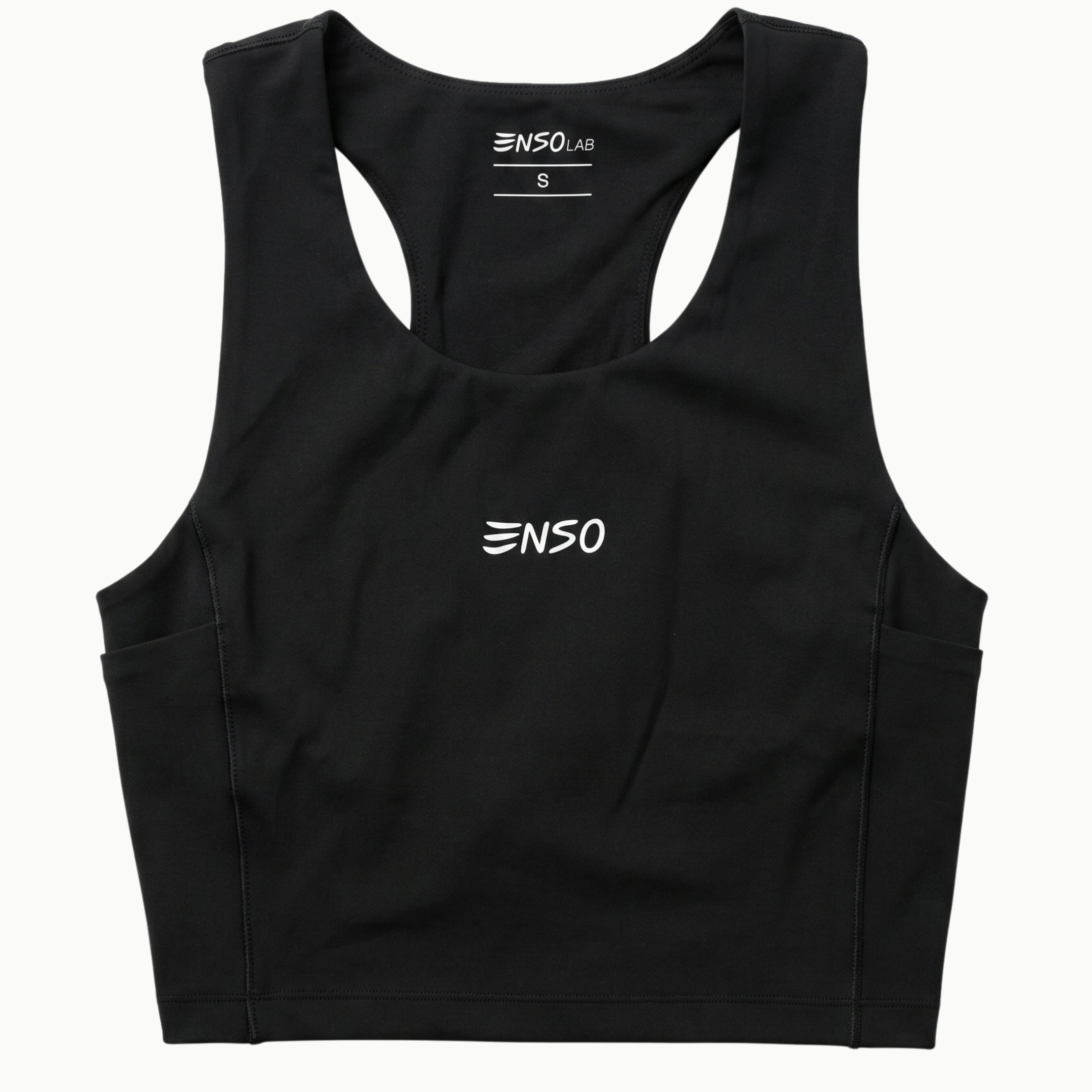 Women's Apex Crop Compression top in Black, flat lay front