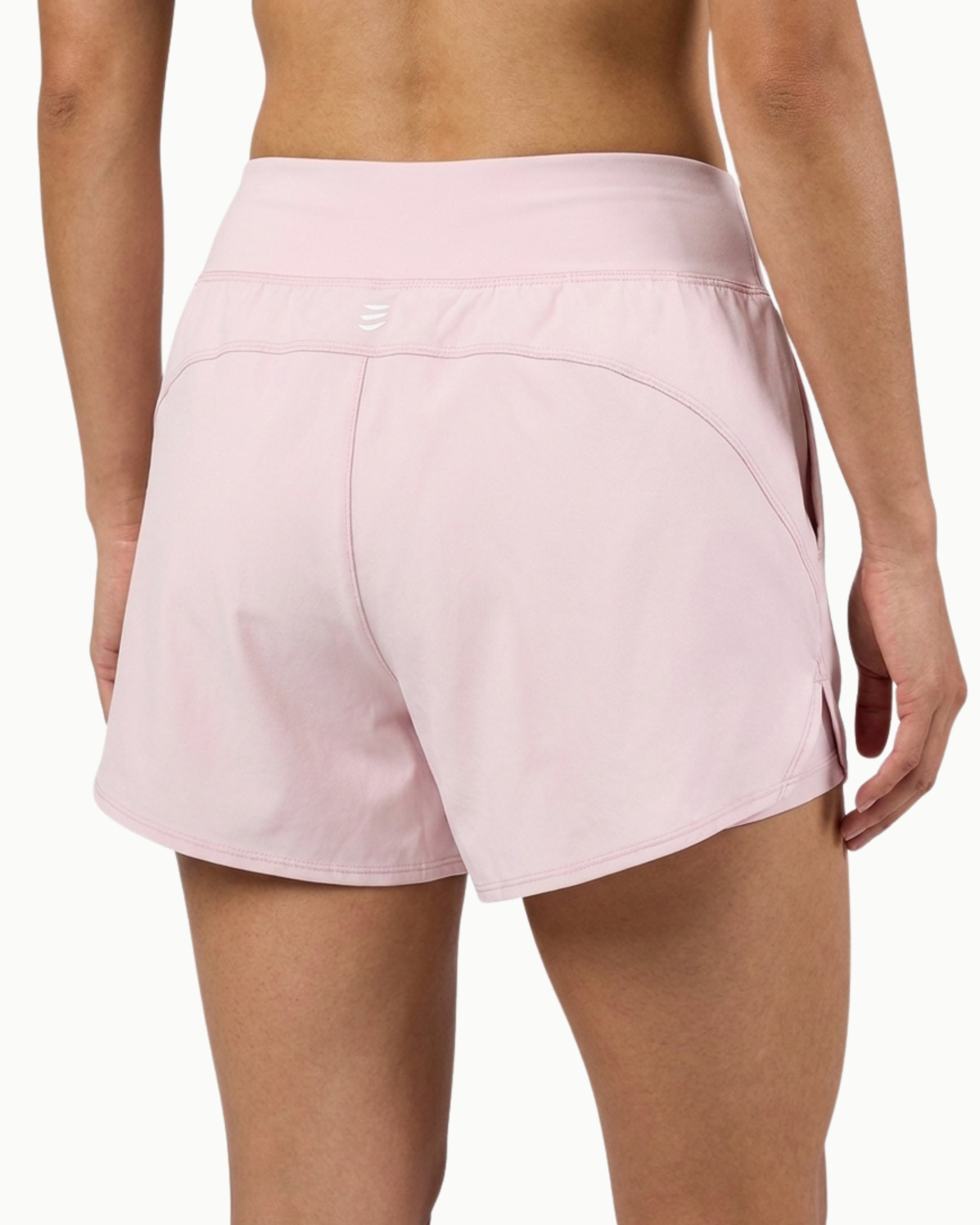 Women's Training Short in Marshmallow, back view on model