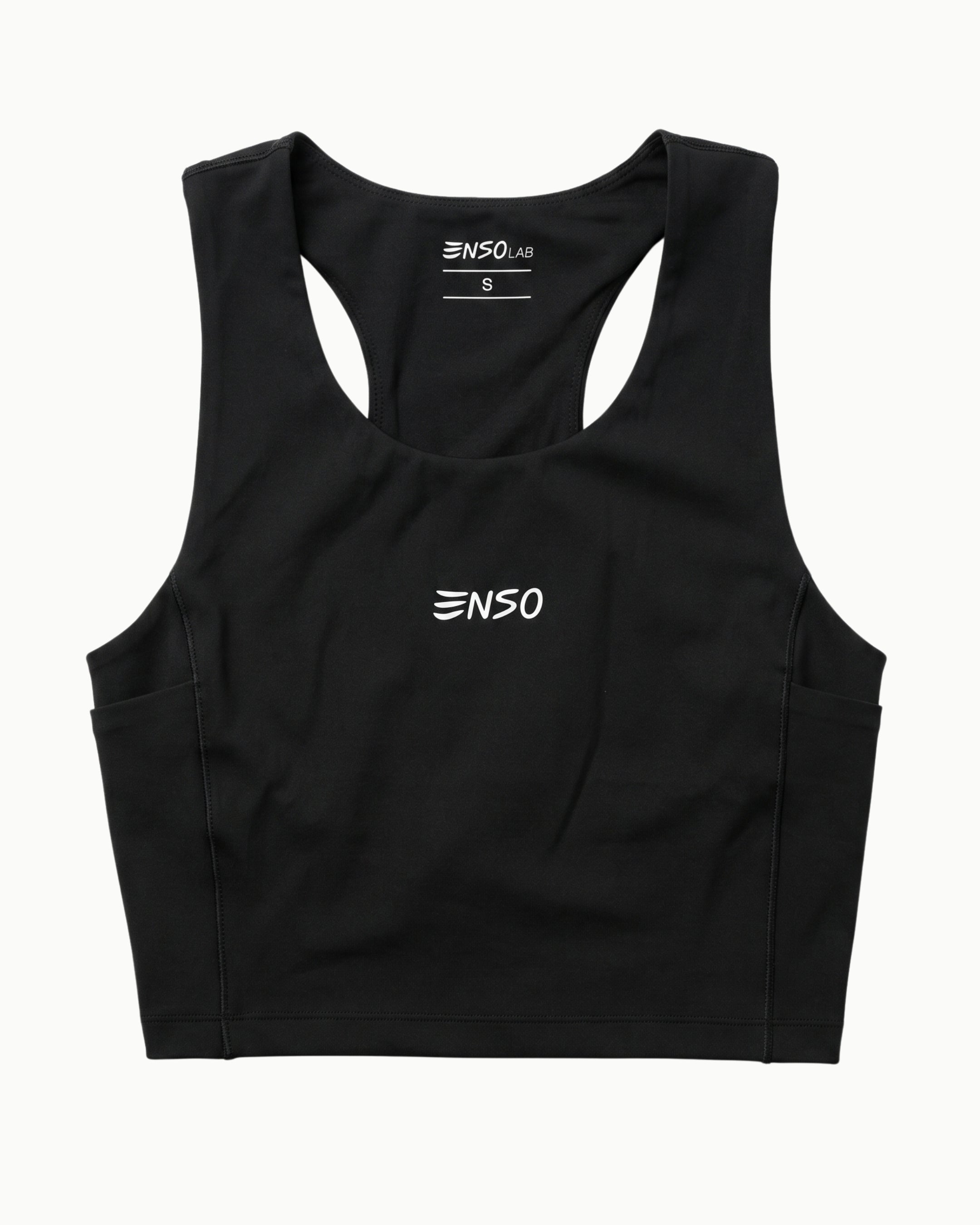 Women's Apex Crop Compression top in Black, flat lay front