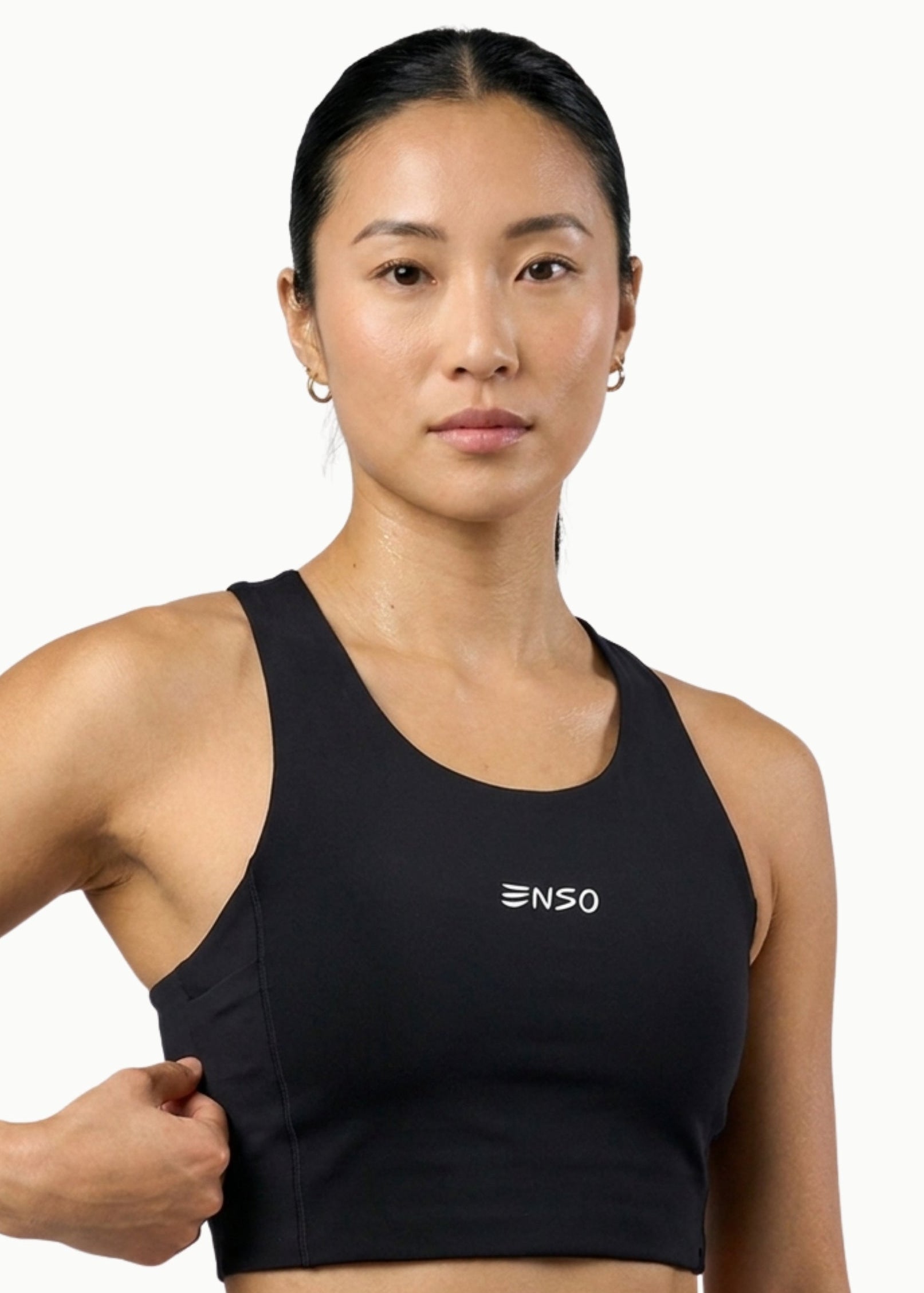 Women's Apex Crop Compression top in Black, front view on model