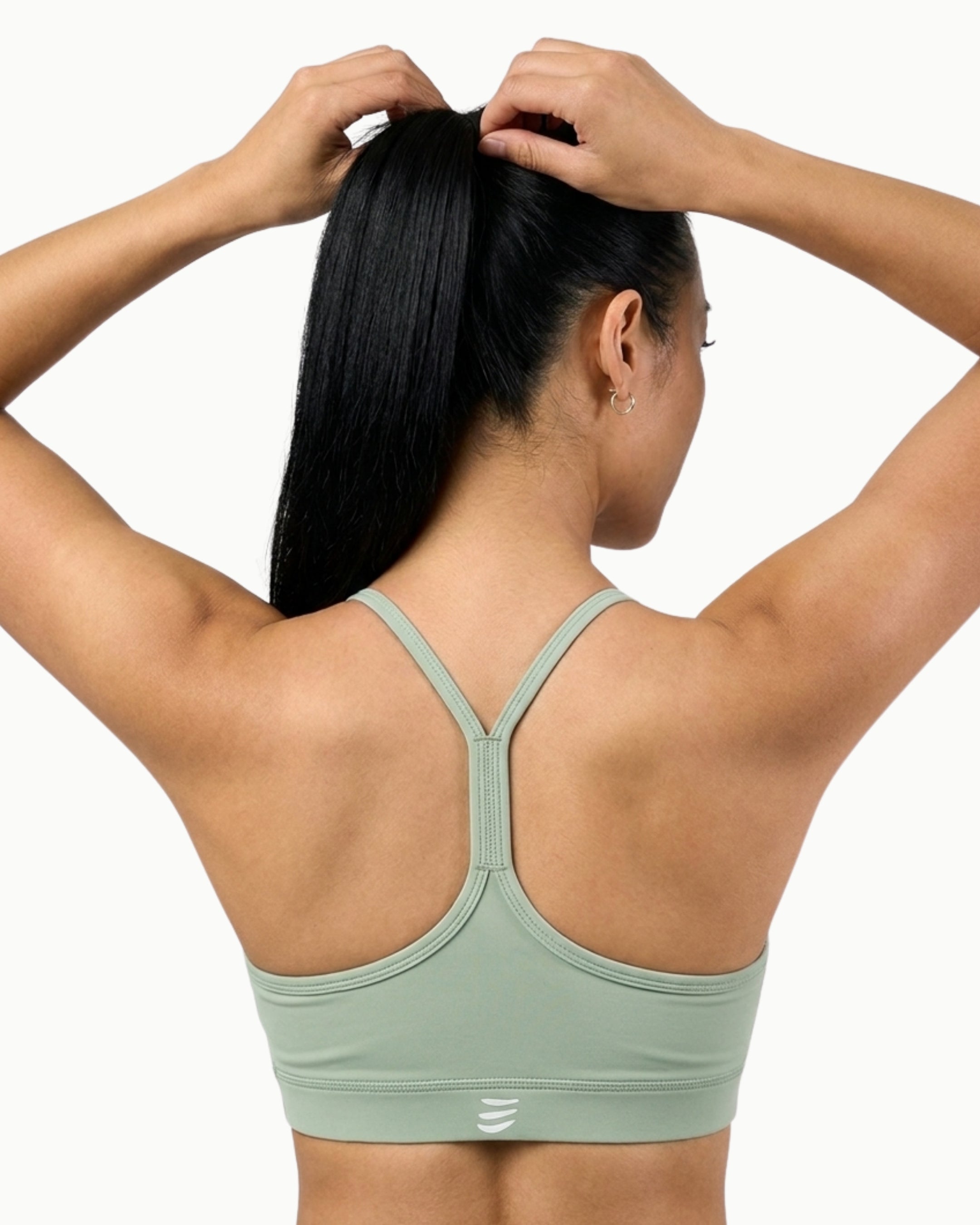 Women's Drift Bra in Desert Sage, back view on model