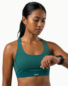 Women's Foundation Bra in Aquamarine Green, front view on model