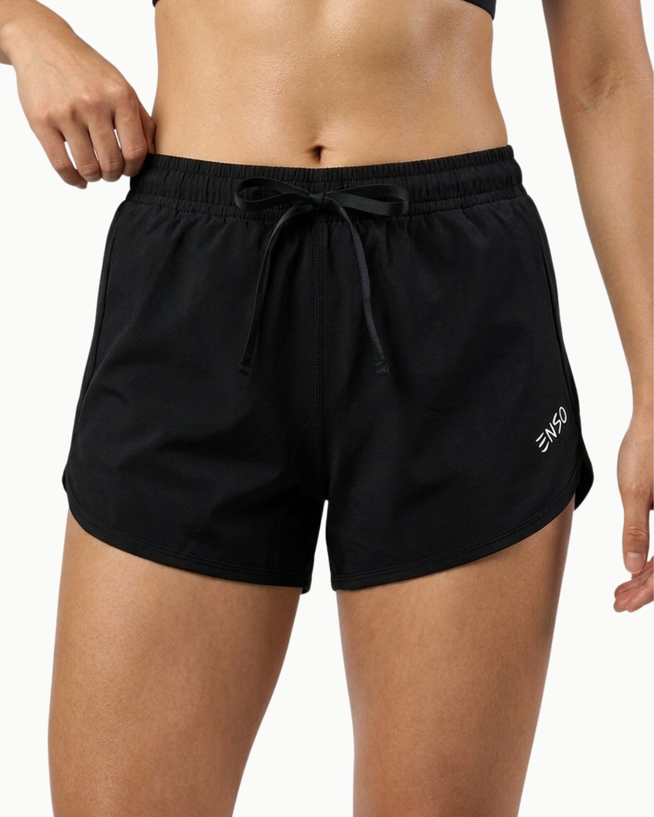Women's Rhythm Short in Black, front view on model