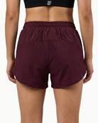 Women's Rhythm Short in Wine, back view