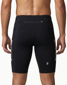 Men's 9 inch Surge Half Tight in Black, back view on model