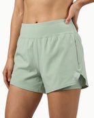Women's Training Short in Desert Sage, front view on model