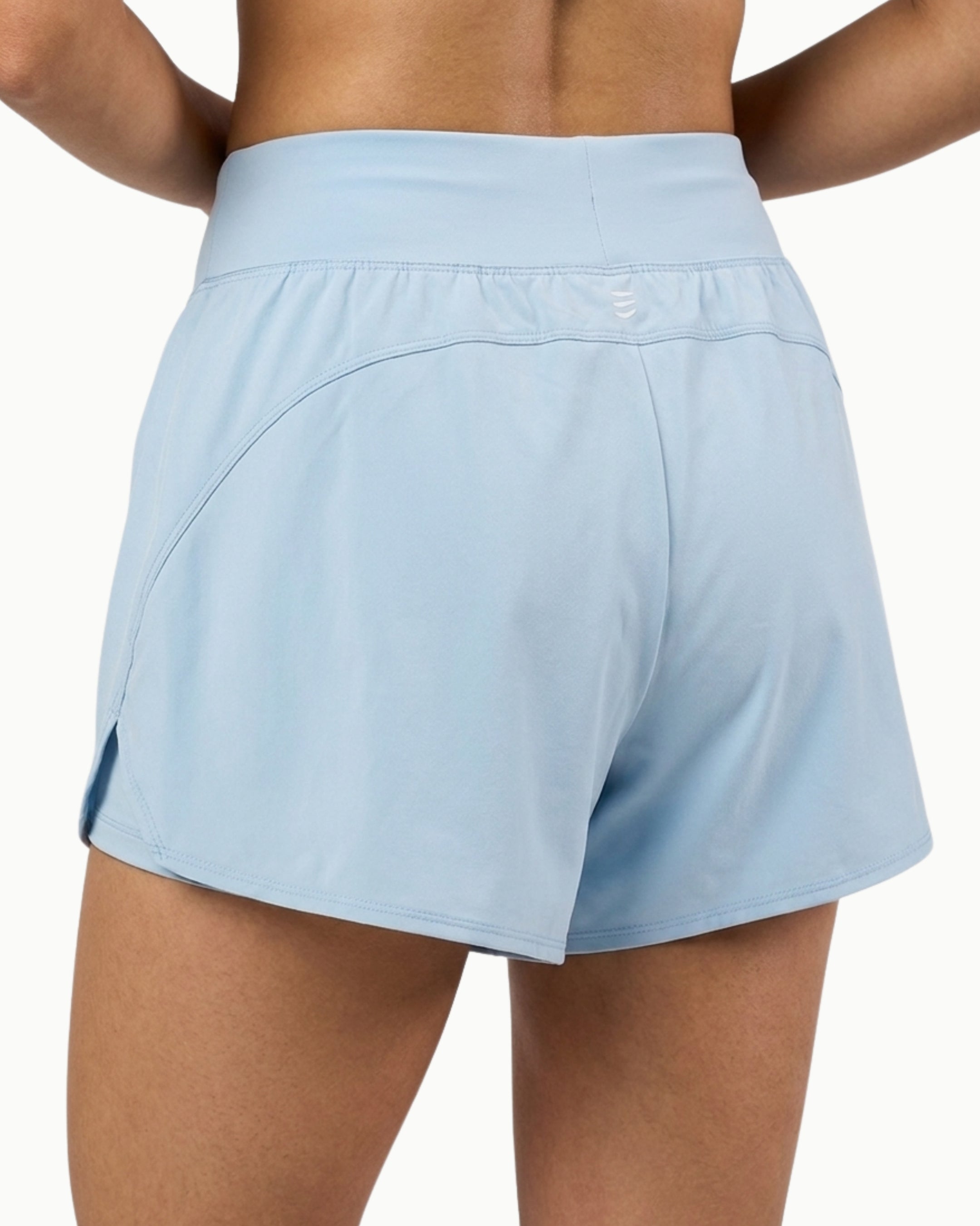 Women's Training Short in Ice, back view on model